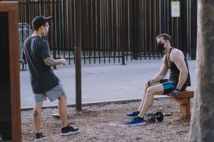 people with masks working out